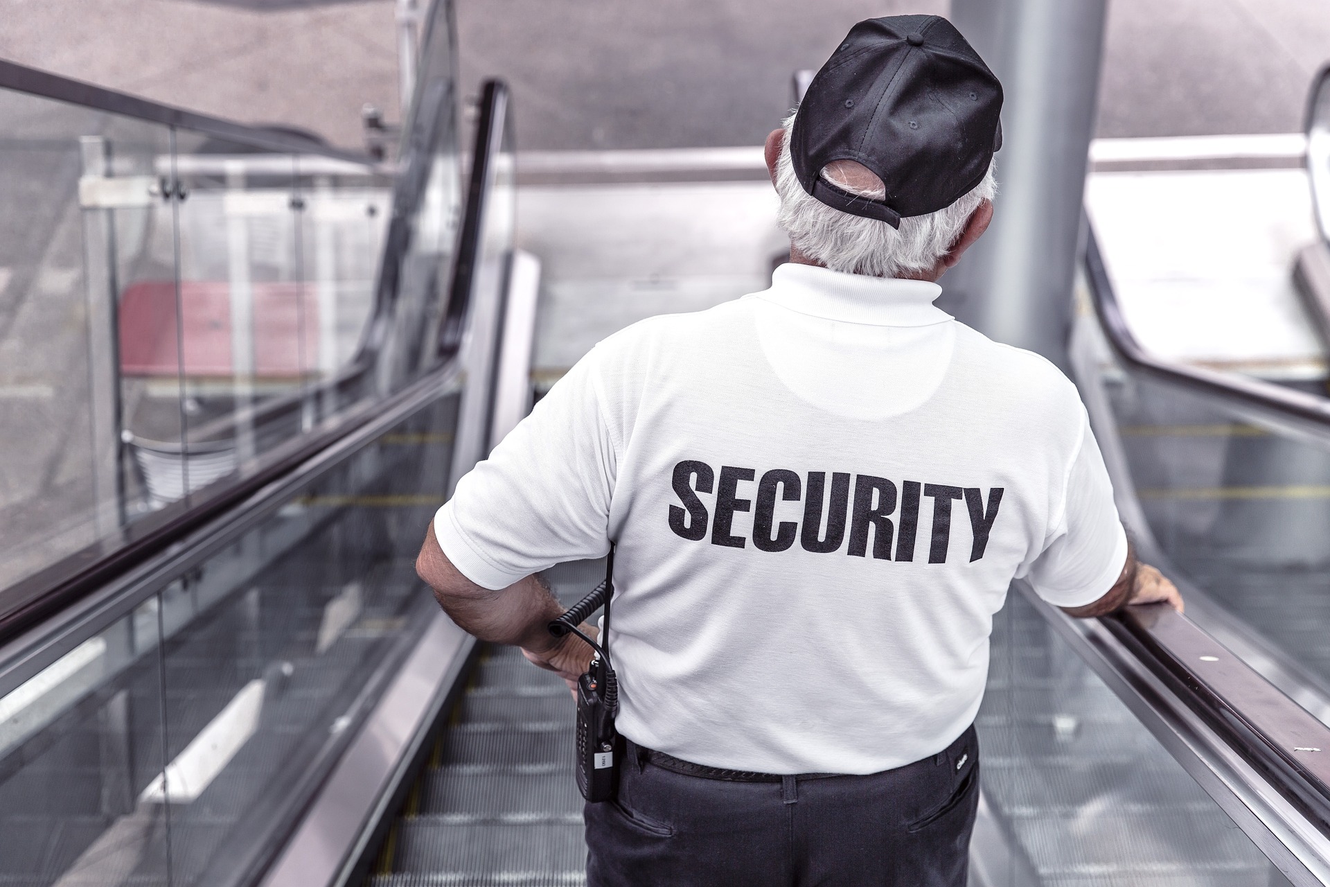 Security officer on patrol inside a modern facility